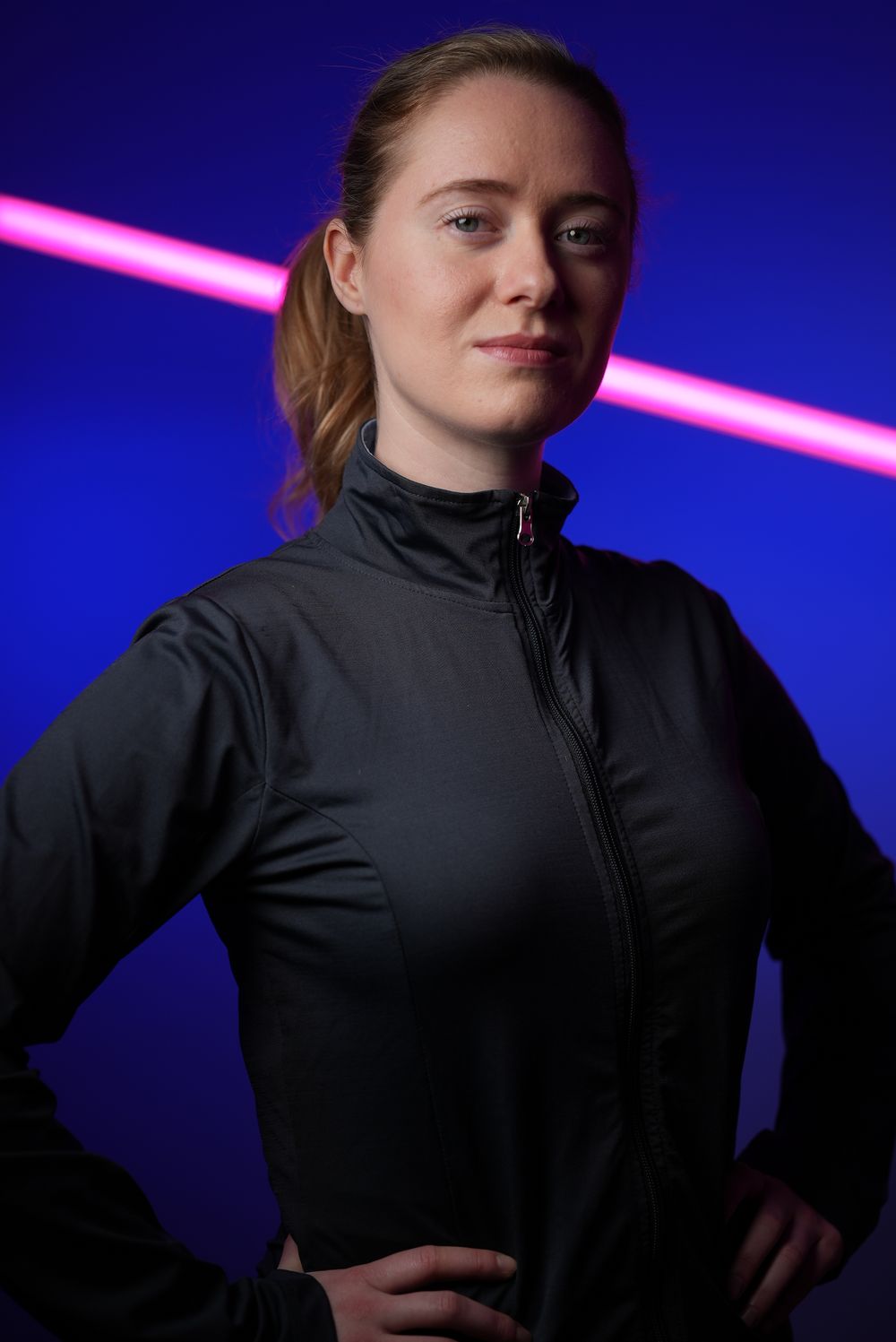 Portrait with pink neon light by Chris Gorys